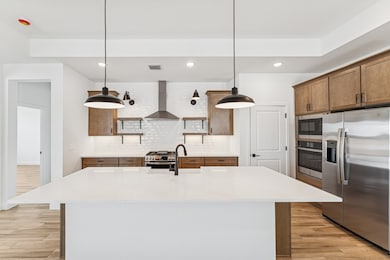 Kitchen with pendant lights & floating shelves