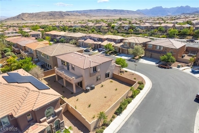 Aerial perspective of suburban area featuring moun