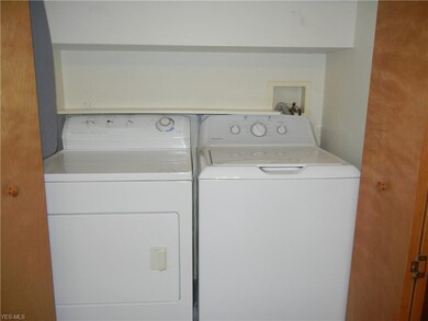 First floor washer and dryer off kitchen