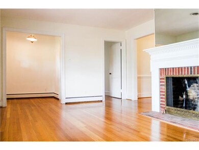 Livingroom looking toward foyer and to doorway to 