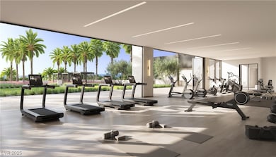 Workout area featuring floor to ceiling windows an