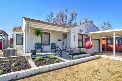 View of front of house featuring a garage, central