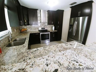 Recently updated granite countertops with wood cab