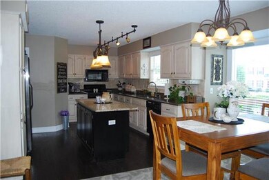 Eat-in kitchen, view to pool.