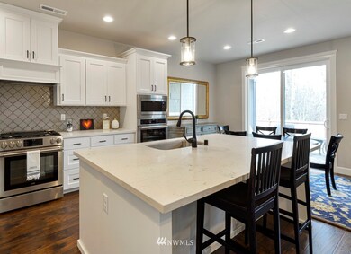 The floorplan of this gorgeous home is superbly thought out, with abundant space everywhere. Not only did the original purchasers have the builders add upgrades, they also then added about $5k in window treatments, including a remote-controlled shade on the stairway window. Everything is move-in ready and perfect for you!