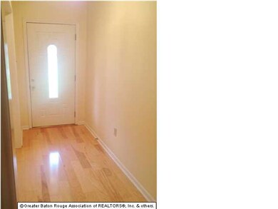 Beautiful Wood floors in foyer, hallway, living , 