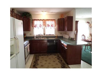 Kitchen. Cherry cabinets, eat-at bar
