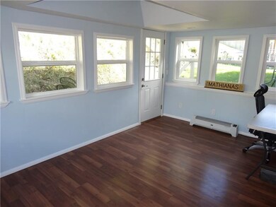 Sunroom off dining room/kitchen could be used as a