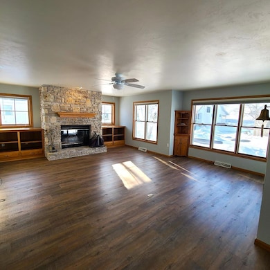 Living Room w/ Fieldstone FP