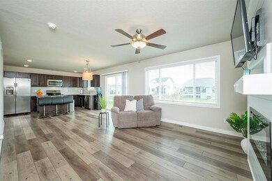 open layout of living room, dining area and kitche