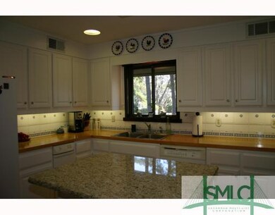 Kitchen. Kitchen with granite and raised panel cab