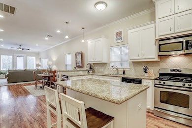 First floor features kitchen, living room, dining