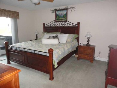Master Bedroom. The master bedroom has sliding doo