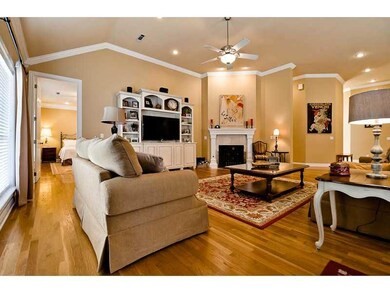 Living Room. Floor-to-ceiling windows traverse the