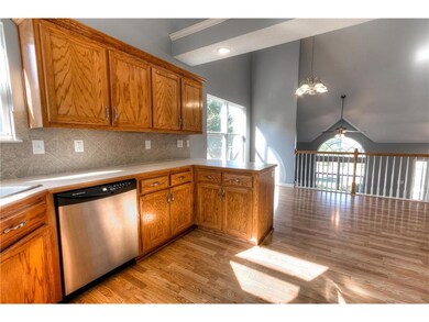 Stainless steel appliances and lots of cabinets
