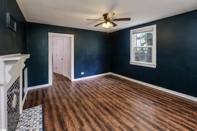 Luxury Laminate plank flooring, ceiling fan.