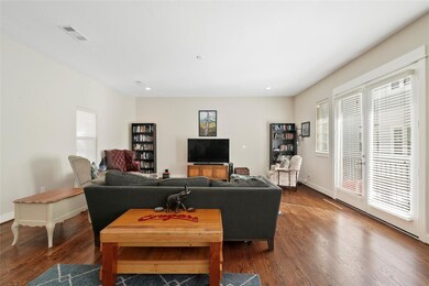 Staged.  Another view of the living room with many