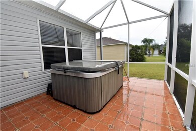 Screened-in Birdcage enclosure with hot tub.