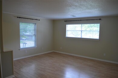 Unfurnished room with a healthy amount of sunligh