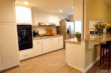 HERE IS ANOTHER VIEW OF THE KITCHEN WITH DOUBLE PE