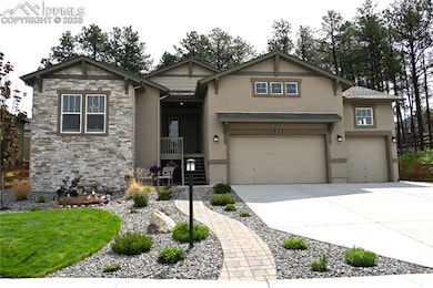 Stucco and Stone home, custom extended front patio  and curved path enjoy serene front facing open space