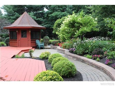 Backyard. FABULOUS LUSH GARDENS...BRAND NEW DECK!!