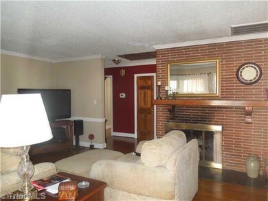 Living Room. Living Room features Brick fireplace with propane gas logs.