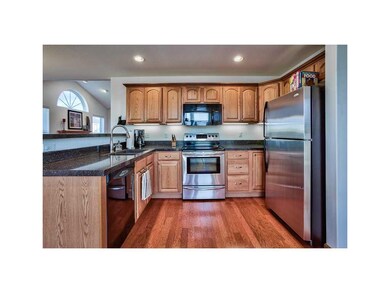 Kitchen. RAISED BREAKFAST BAR AND UNDER MOUNT SINK