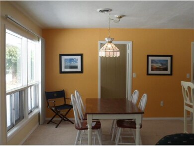 Dining Room. Dining Area overlooks treed backyard.