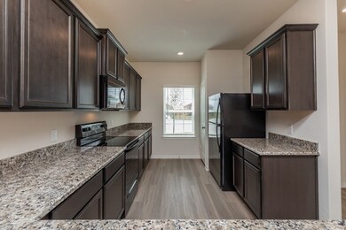 25481 Black Spruce Dr, Cleveland, TX 77328 - photo 2