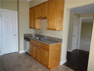 Another view of kitchen.  Pantry door is to the le