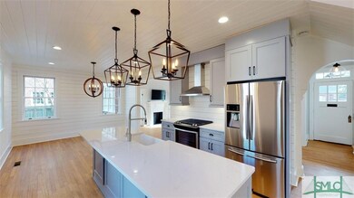 Cambria quartz countertops. Farmhouse sink. Commer