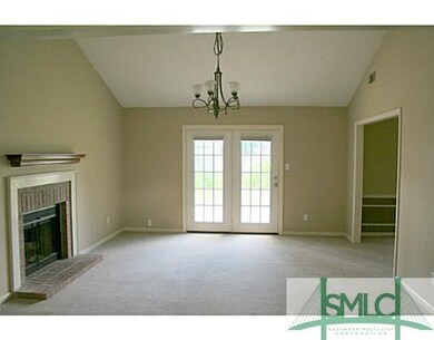 Den/Family/Great Room. Opens onto uncovered patio