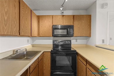 Kitchen view from entry way *Enhanced