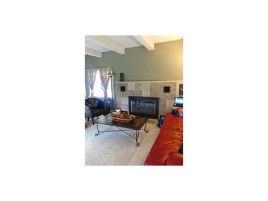 Great Room. Wood-burning fireplace, in Living Room