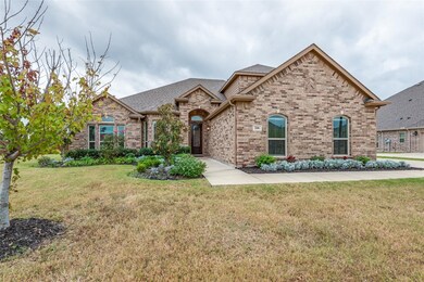 View of front of property with a front yard