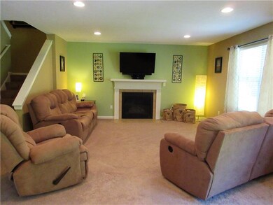 This large, 16x15' family room is brightly lit by 