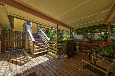 5. front porch with steps to garage