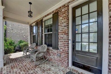 View of patio featuring covered porch