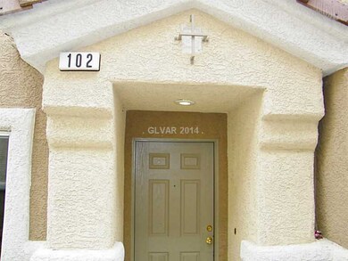 Facade/Exterior Front. Unit 102 includes a 2 car a