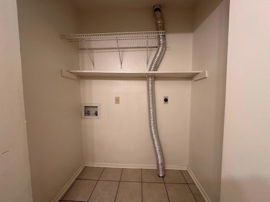 Laundry room with hookup for an electric dryer, t