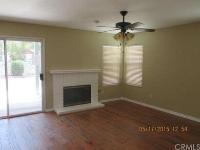 FAMILY ROOM OFF THE KITCHEN WITH FIREPLACE