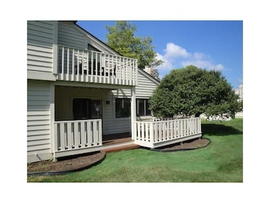 View. The exterior back side of the condo.  Has two decks.  The upper level is a walk out from the master bedroom.