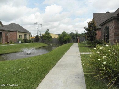 301 C Harbor Bend front with pond