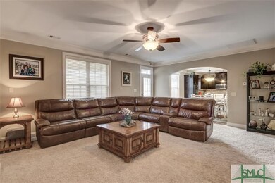 Family room with view to kitchen