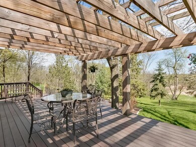The home features multiple decks and porches to re