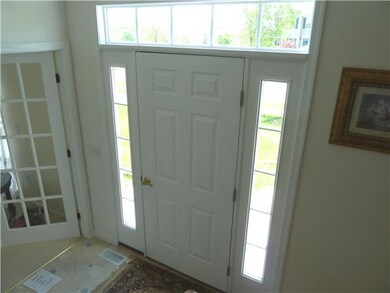 Foyer. Front entry foyer w/lots of window lighting