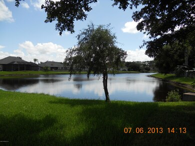 VIEW OF LAKE FROM BACKYARD