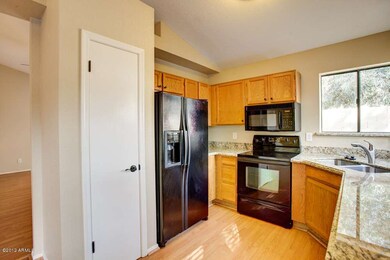 Kitchen w/ Appliances and Pantry