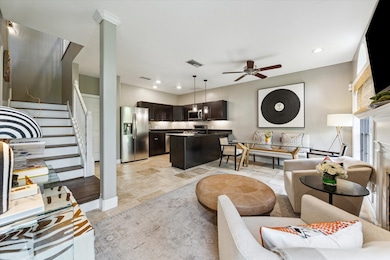 Open-concept kitchen, living, and dining space